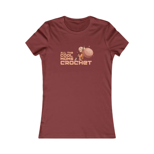 Celebrate moms who crochet with this cardinal red T-shirt from the Gifts For Mom store, featuring ALL THE COOL MOMS CROCHET and a charming illustration of a woman seated beside a large ball of yarn with a crochet hook.