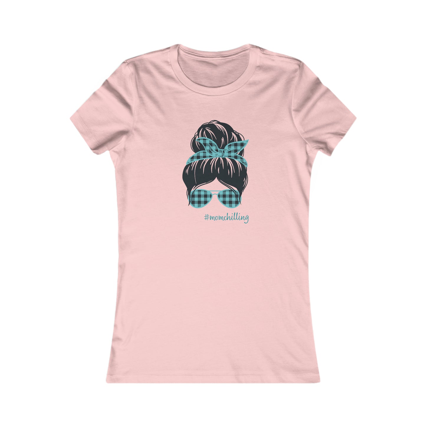 You have found the perfect gift at the Gifts For Mom store: a pink t-shirt adorned with an illustration of a womans hair in a bun, accented by a blue and black checkered print bandana and matching sunglasses. Embrace #MOMCHILLING with this charming design!.