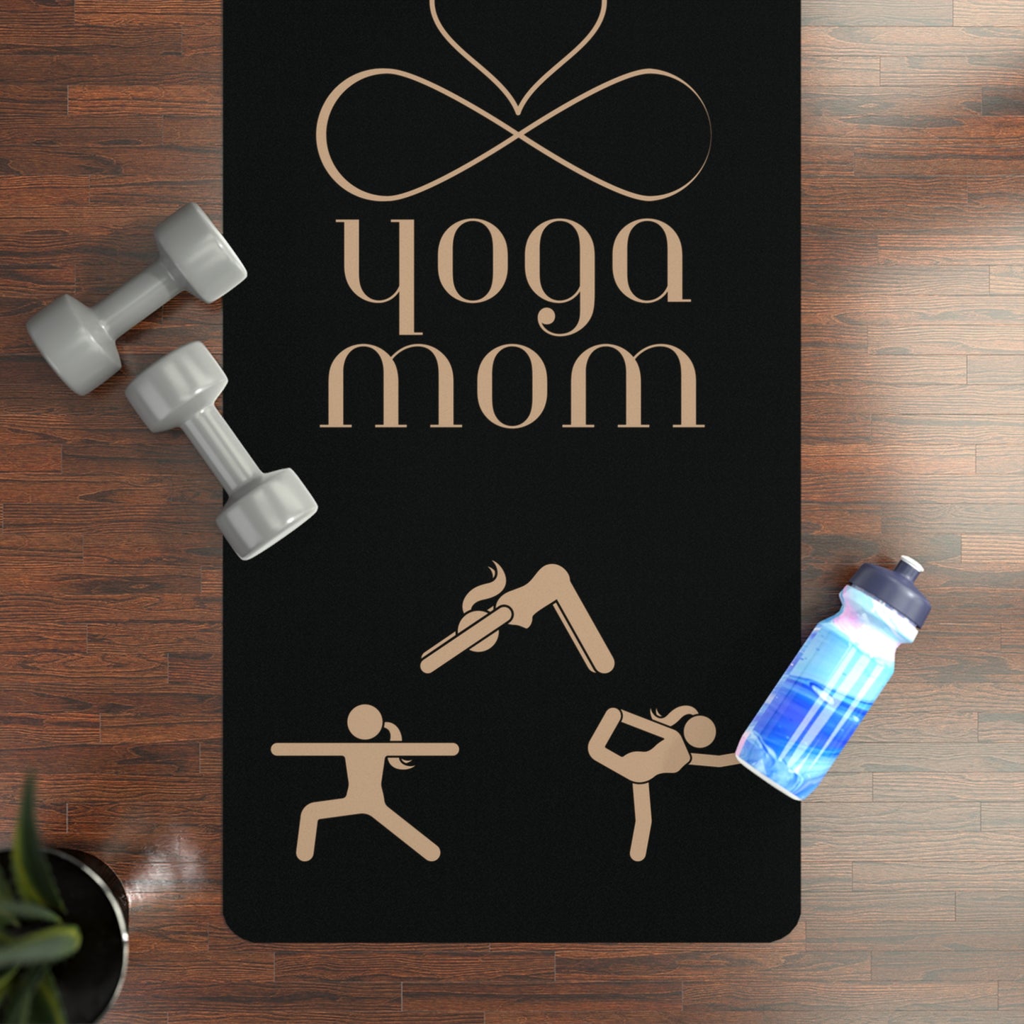 A black rubber yoga mat featuring gold illustrations of various poses, with yoga mom in stylized text at the center, surrounded by six symmetrical pose illustrations. It includes a carrying strap, making it an ideal find from the Gifts for Mom store.