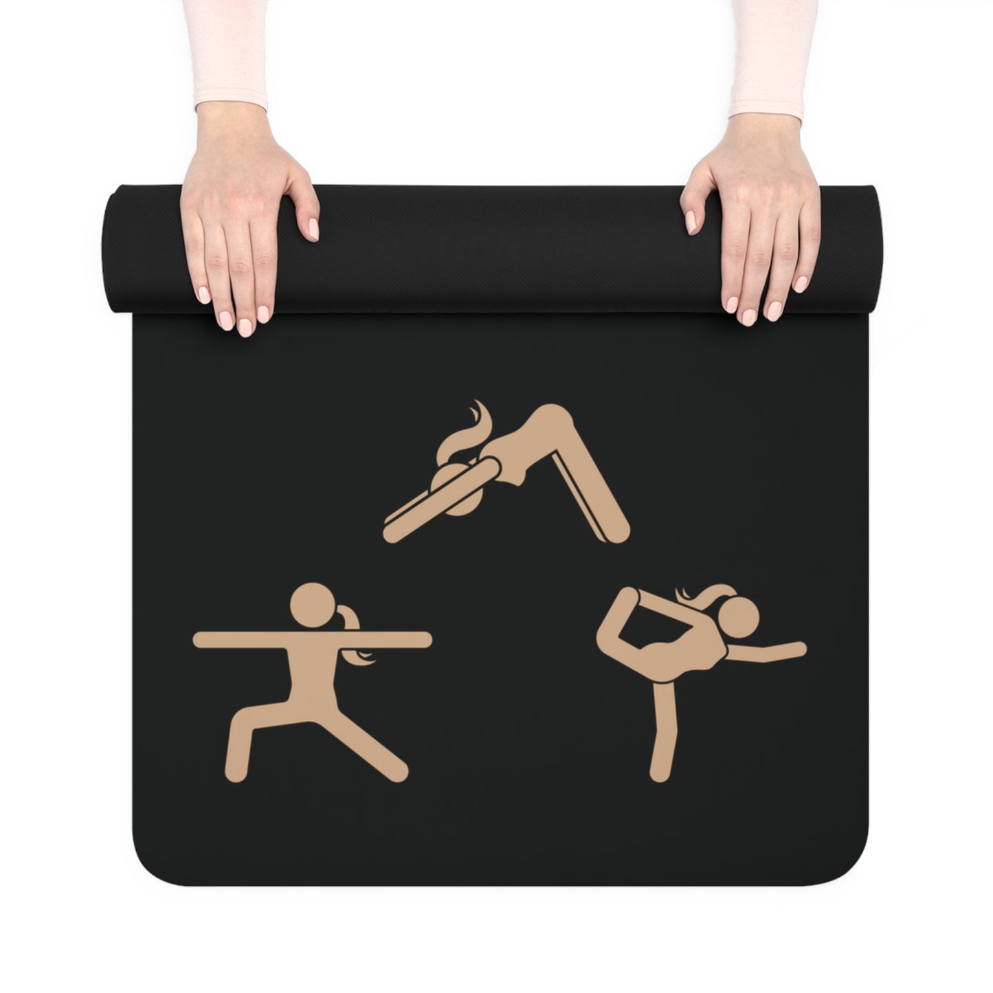 A person rolling up a black rubber yoga mat featuring gold illustrations of various poses, with yoga mom in stylized text at the center, surrounded by six symmetrical pose illustrations. It includes a carrying strap, making it an ideal find from the Gifts for Mom store.