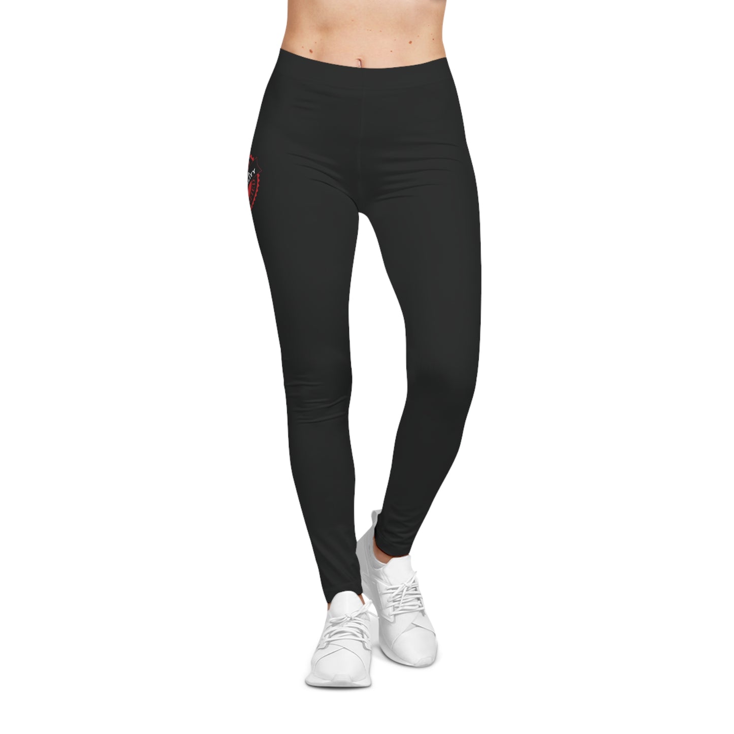 Front view of a person wearing black leggings featuring a red circular logo that reads Mama Mentality. They wear white sneakers against a pristine white background.