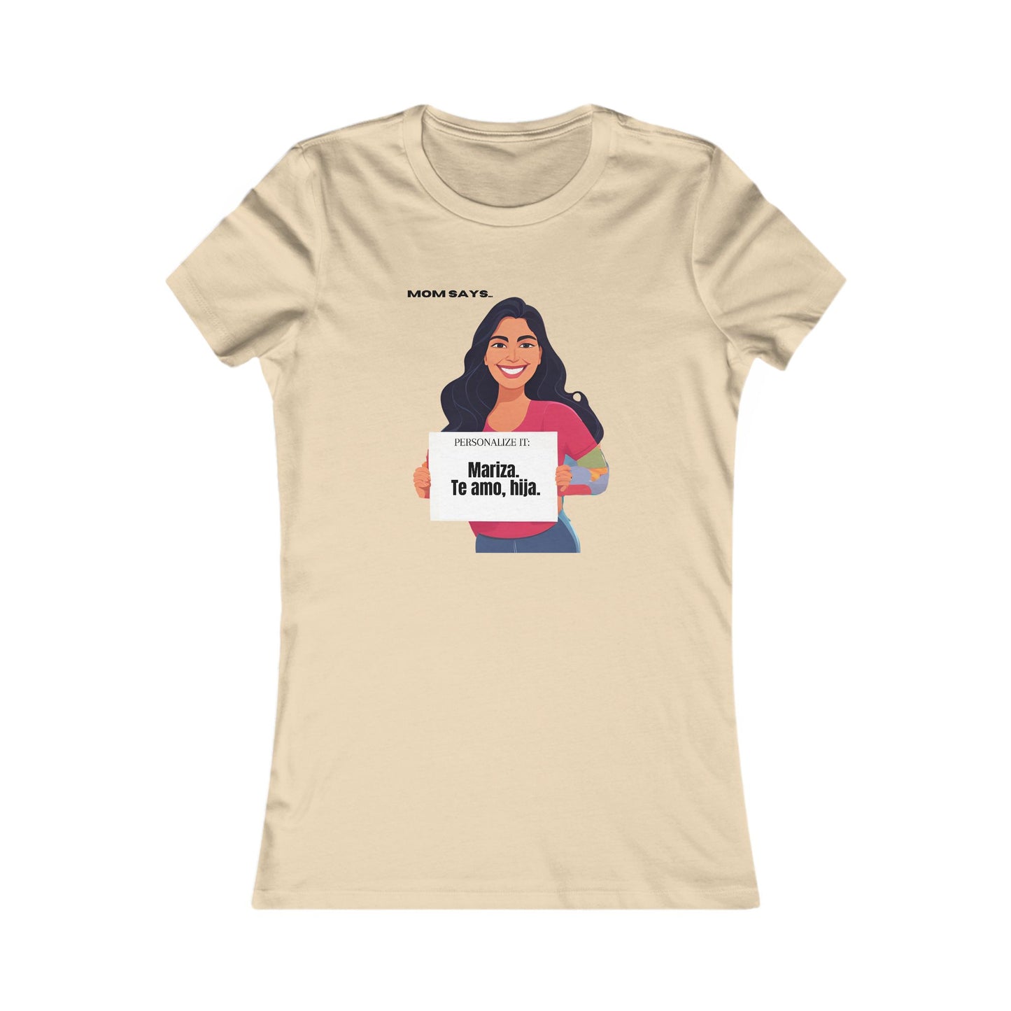 Personalizable cream t-shirt from the Gifts For Mom store, featuring a woman holding a sign that reads Personalized it: Mariza, Te amo, hija. Above her, text says Mom Says. Perfect for those seeking unique gifts where se habla español.