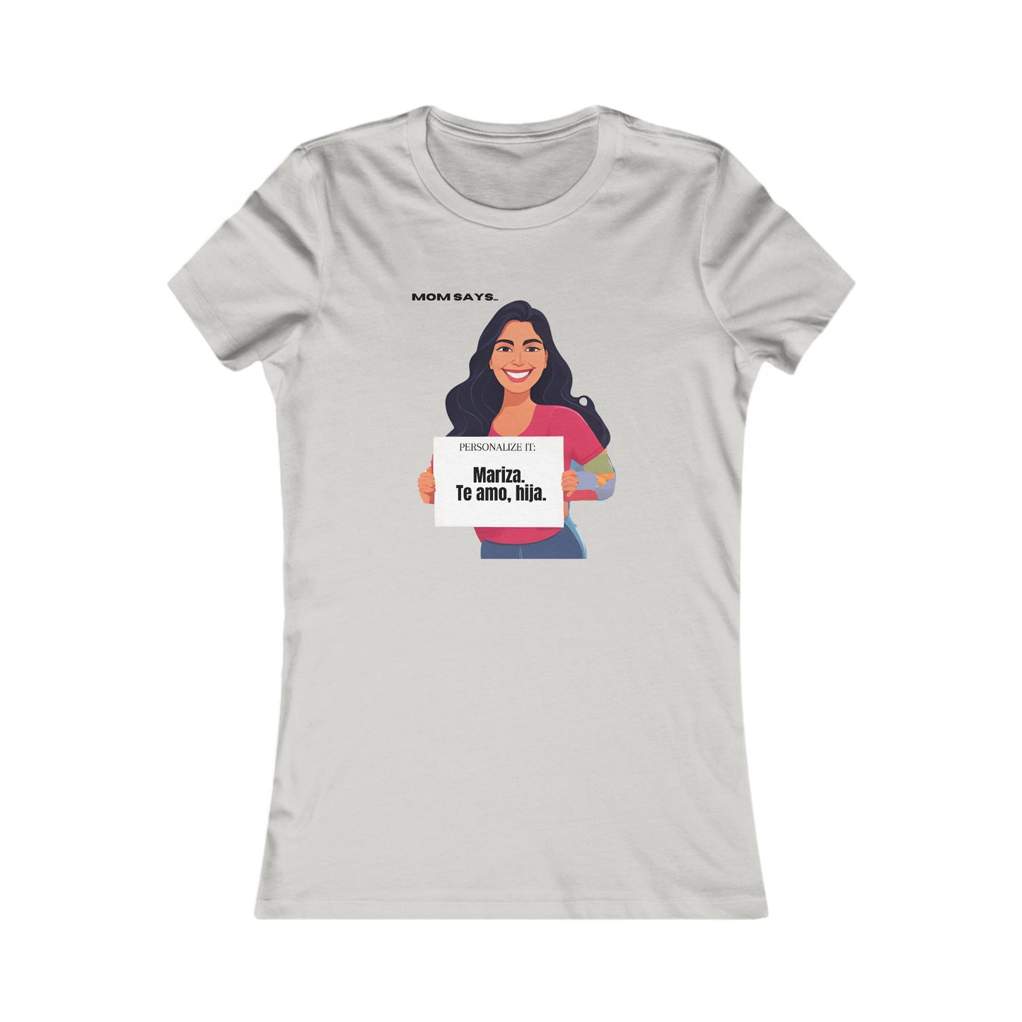 Personalizable grey t-shirt from the Gifts For Mom store, featuring a woman holding a sign that reads Personalized it: Mariza, Te amo, hija. Above her, text says Mom Says. Perfect for those seeking unique gifts where se habla español.