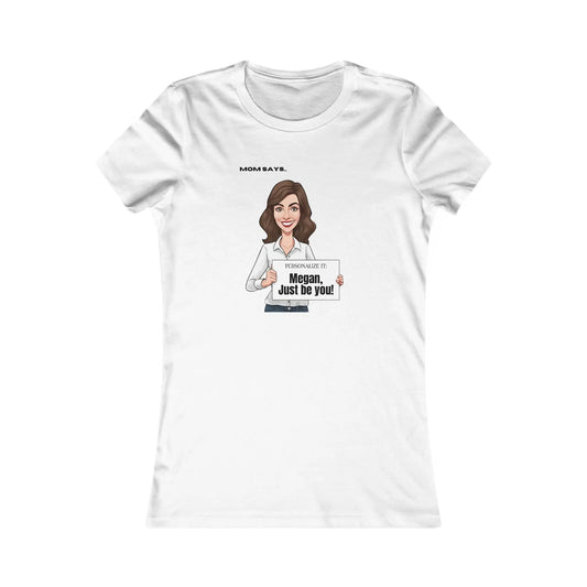 Personalizable white t-shirt from the Gifts For Mom store, featuring a brunette white woman holding a sign that reads Personalized it: Megan, just be you!. Above her, text says Mom Says. Perfect for those seeking unique gifts.